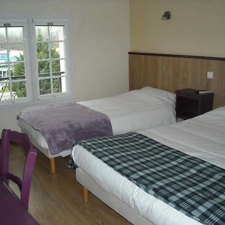 Hotel Ecusson Saint-Hilaire-de-Brethmas Bagian luar foto
